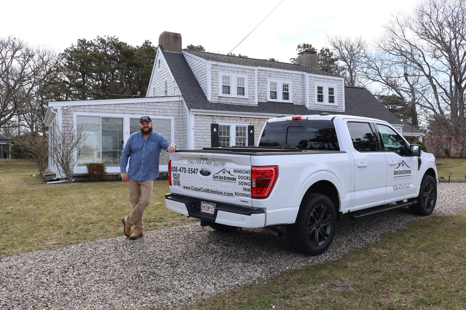 Cape Cod Exteriors founder with company truck at Cape Cod home